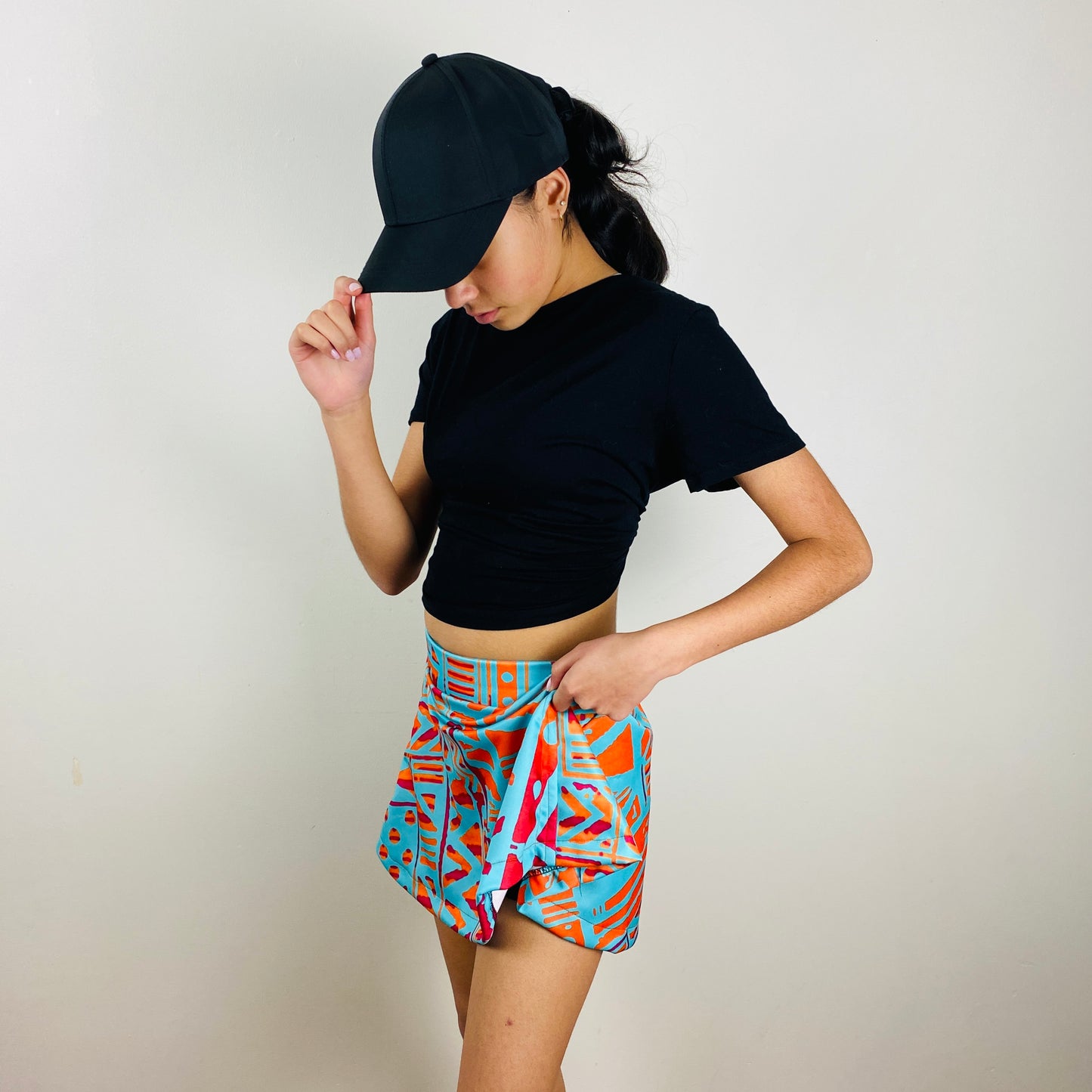 Girls Pickleball Skort – Turquoise & Orange Geometric Print