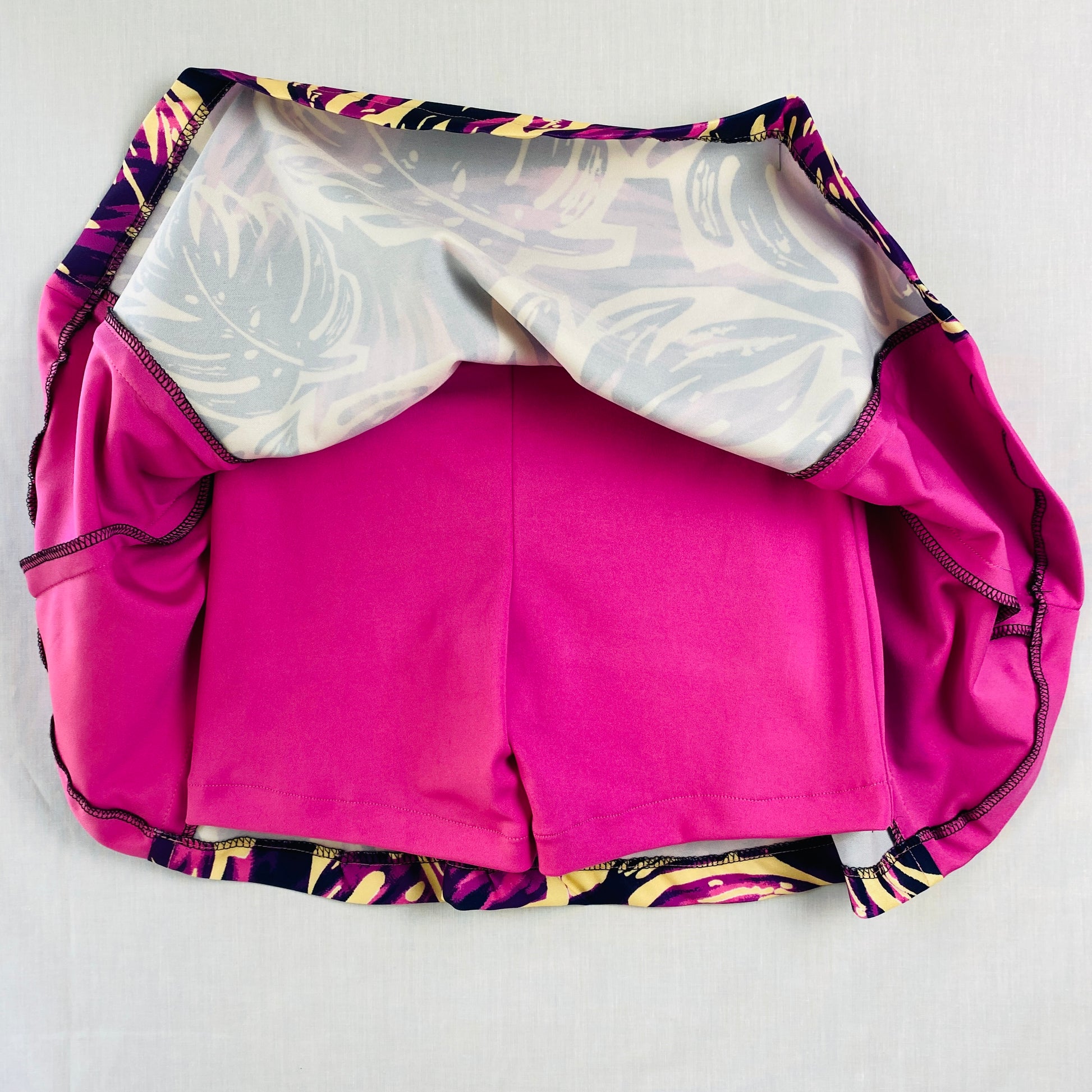 Pickleball Skort for Active Teens (Ages 10–14) – Pink & Purple Tropical Print

Vibrant girls’ pickleball skort featuring a pink and purple tropical print. Made from soft, stretchy polyester & spandex with built-in shorts for comfort and coverage.

Designed for movement, confidence, and all-day active wear.

Perfect for pickleball, tennis, dance, school sports, gym class, and casual outings.

Designed and sewn in Australia.
