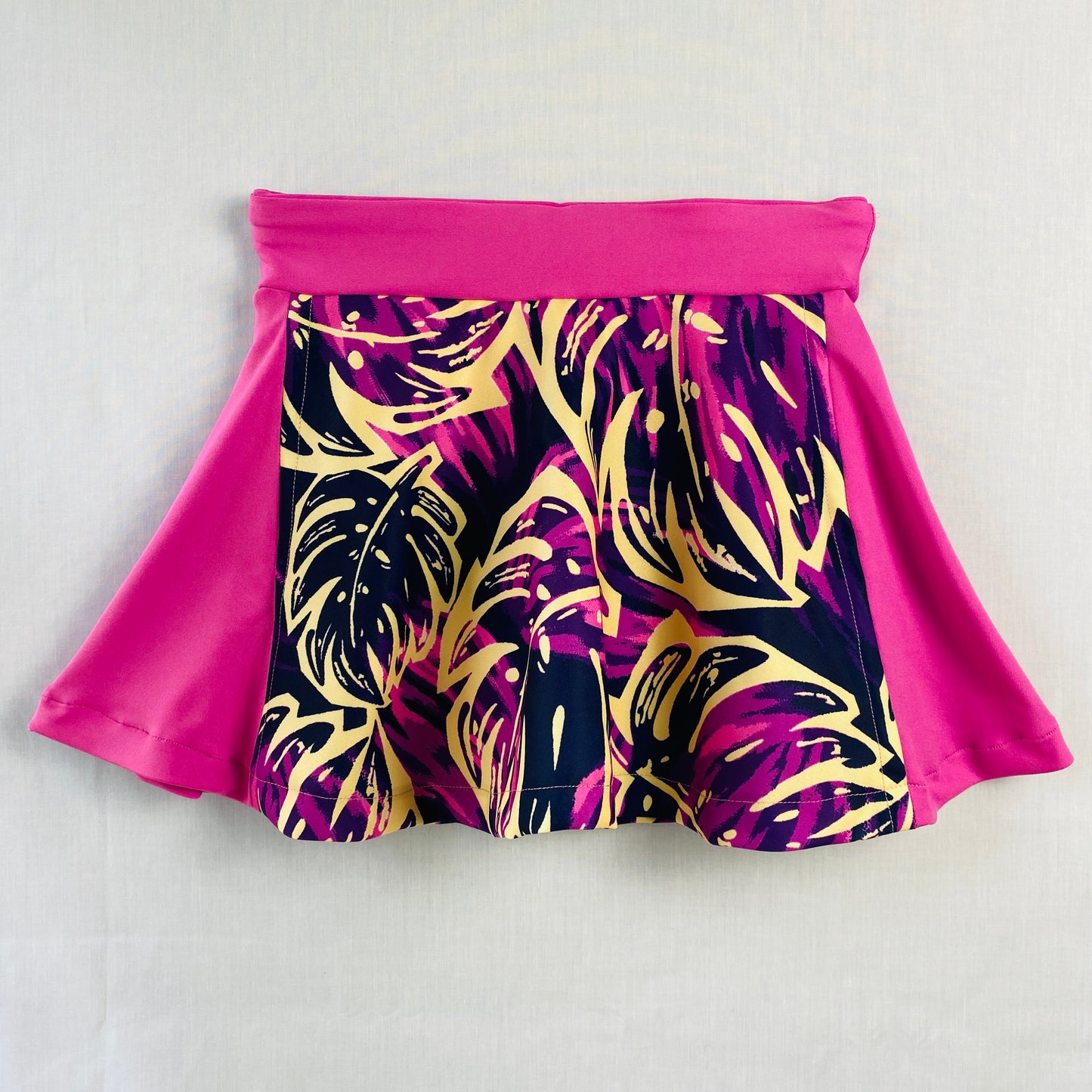Pickleball Skort for Active Teens (Ages 10–14) – Pink & Purple Tropical Print

Vibrant girls’ pickleball skort featuring a pink and purple tropical print. Made from soft, stretchy polyester & spandex with built-in shorts for comfort and coverage.

Designed for movement, confidence, and all-day active wear.

Perfect for pickleball, tennis, dance, school sports, gym class, and casual outings.

Designed and sewn in Australia.
