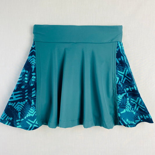 Teen Pickleball Skort (Ages 10–14) – Teal Activewear

Teal girls’ sports skort with a darker blue patterned side panel. Made from soft nylon, spandex, and cotton blend with built-in shorts for comfort and coverage.

Designed for movement, comfort, and everyday active wear.

Perfect for pickleball, tennis, dance, school sports, and casual outings.

Proudly designed and made in Australia.